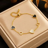 Load image into Gallery viewer, Vintage Black White Enamel Heart Charm BraceletHollow Heart Link Bracelet Elegant Wrist Jewelry for Women