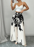 Load image into Gallery viewer, Women Black Ink Floral Print Wide Leg Pants Elastic High Waist Silky Satin Palazzo Trousers Summer Vacation Casual Loose Long Pants Beach Bottoms Vestidos